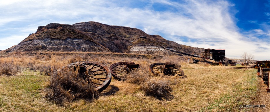 Large steel wheels lay abandoned near the Atlas Cole Mine  near Drumheller, Alberta, Canada.