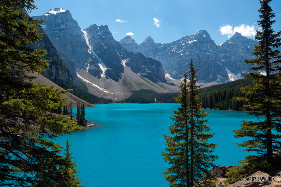 The blue waters of the glacially-fed Moraine Lake in the Valley of the Ten Peaks in the Alberta Rocky Mountains.