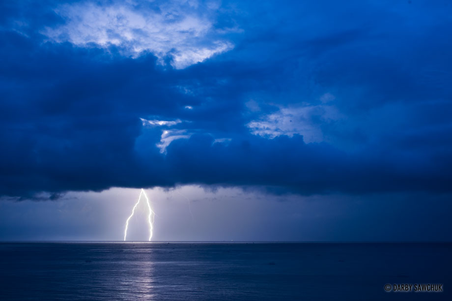 Lightning forks into the sea off the northern coast of Bali.