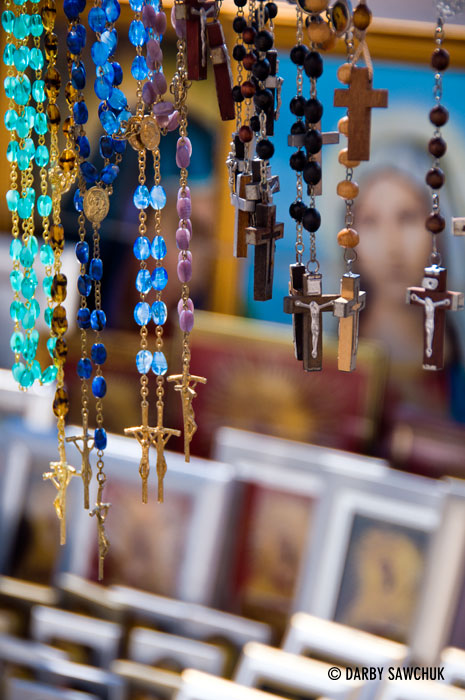 Crosses and other religious icons on sale at a market stall in Vilnius, Lithuania.