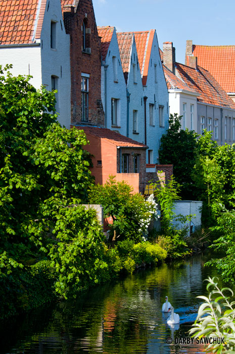 A quiet, residential section of the Gouden-Handrei canal in Bruges, Belgium.