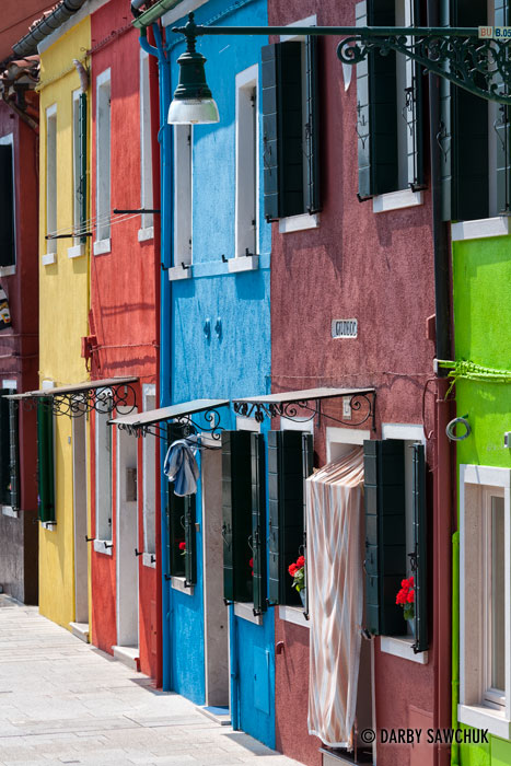 Burano Italy features houses sporting all the colours of the rainbow.
