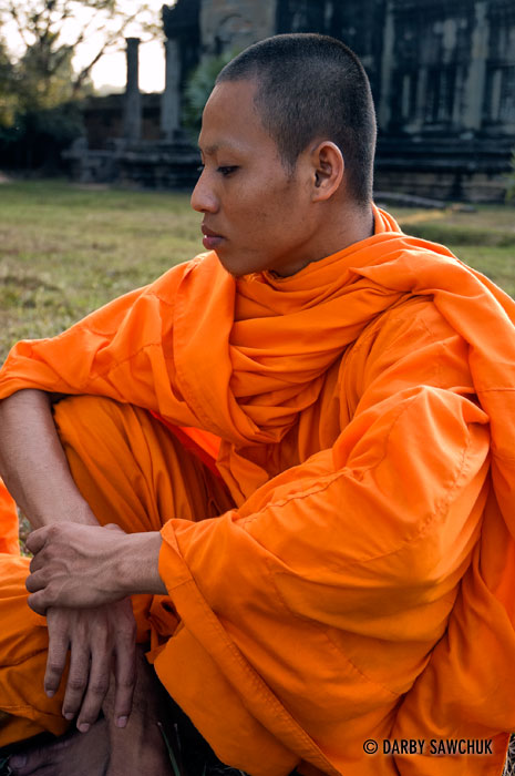 A novice Buddhist monk at the temple of Angkor Wat in Cambodia.