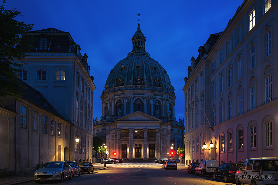The exterior and dome of Frederik's Church at night in Copenhagen.