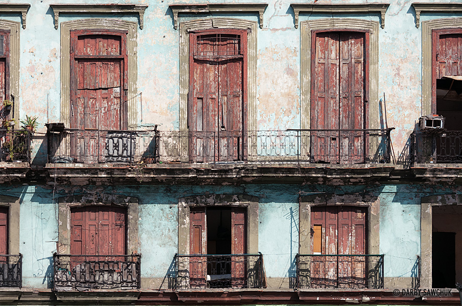 Unrestored balconies of colonial buildings in central Havana, Cuba.