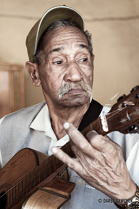 A guitarist plays a song in Trinindad, Cuba.