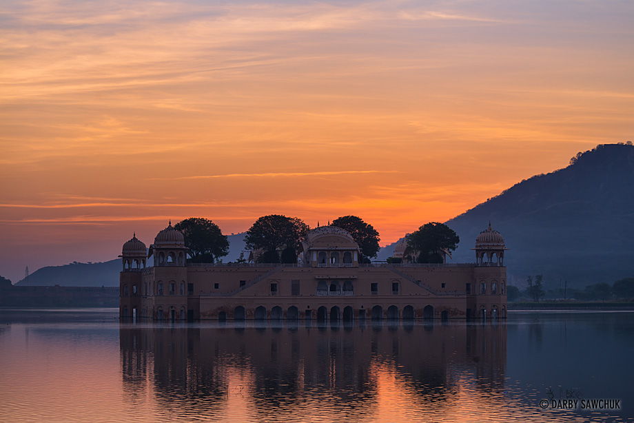 The sun rises over Jal Mahal, the Water Palace at the centre of Man Sagar Lake in Jaipur, India.