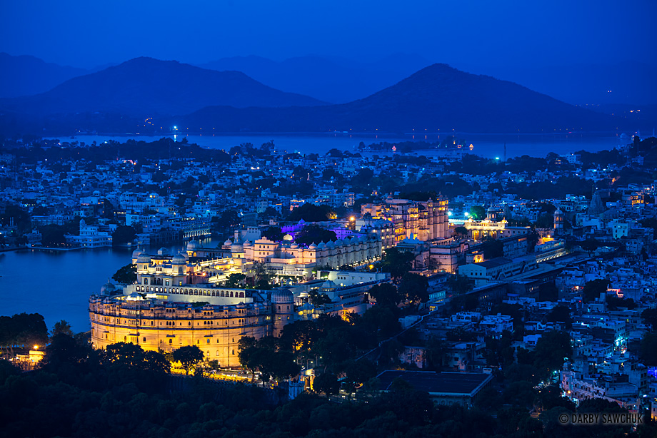 The City Palace of Udaipur at dusk.