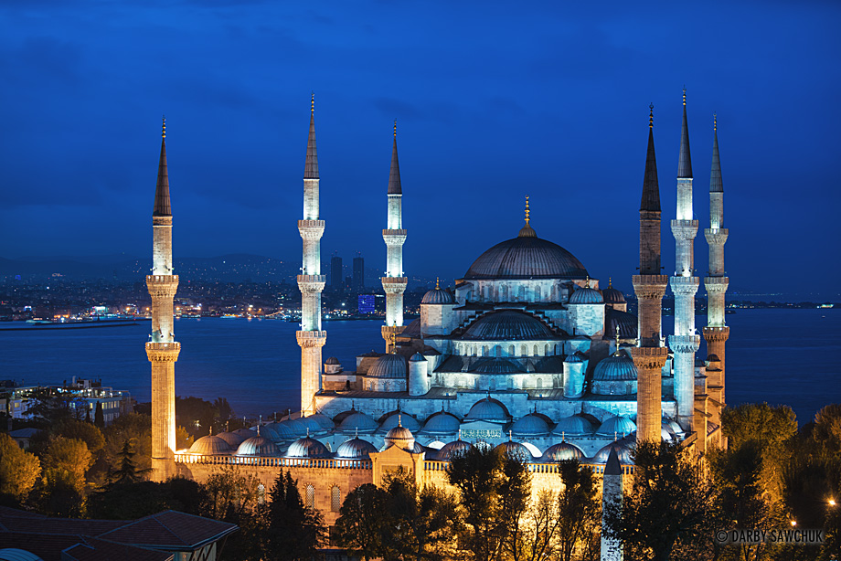 The Blue Mosque in Istanbul Turkey at dusk with the Bosphoros straight behind it.