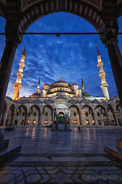 The inner courtyard of the Blue Mosque before sunrise in Istanbul, Turkey.