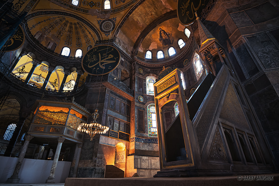 The minbar (pulpit) of the Hagia Sophia with the apse and its golden mosaic of the virgin and child.