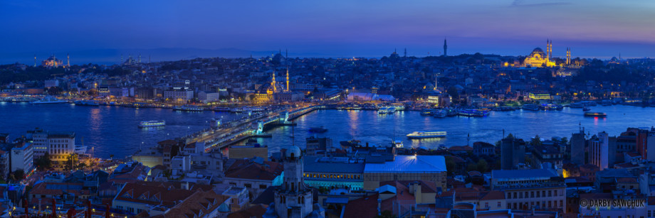 A panoramic view of the Galata Bridge spanning the Golden Horn in Istanbul, Turkey.