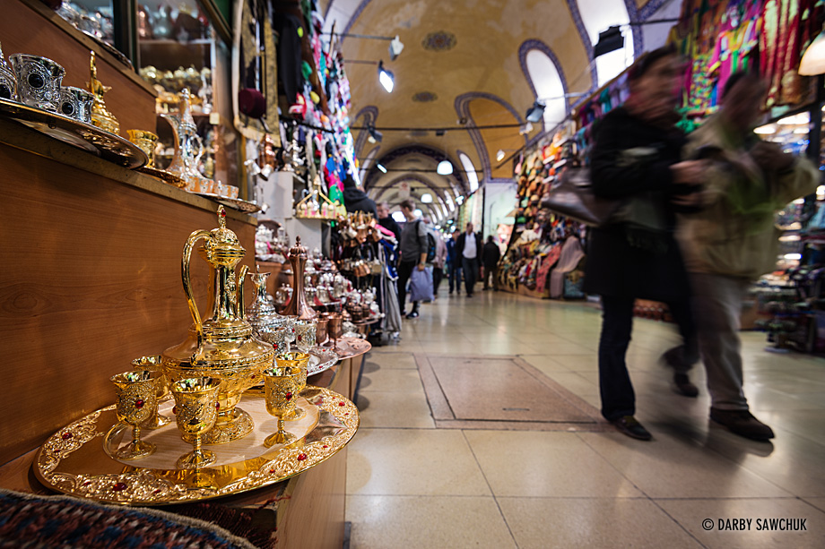 Shoppers browse traditional tea sets in the Grand Bazaar in Istanbul, Turkey.