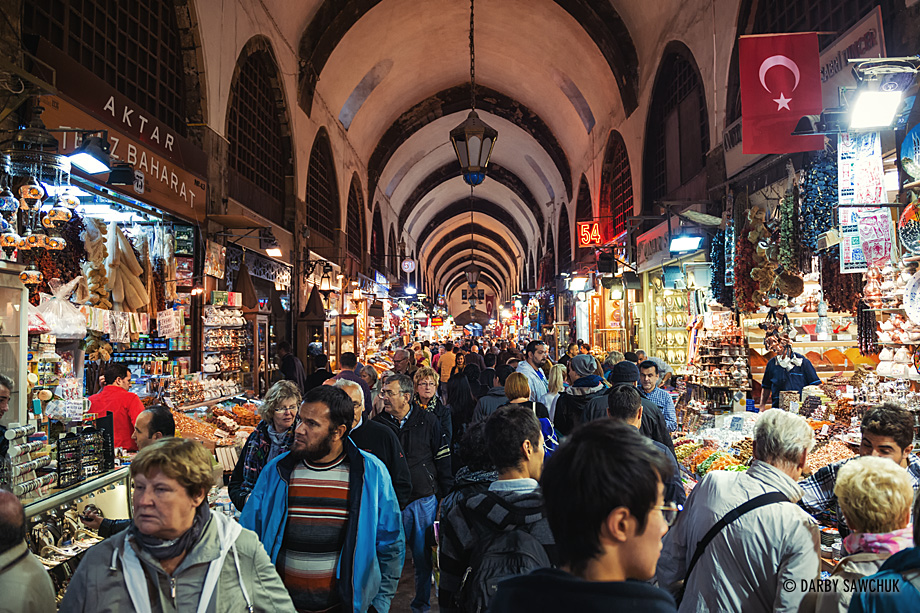 Crowds of shoppers peruse the stalls at the Spice Market in Istanbul, Turkey.