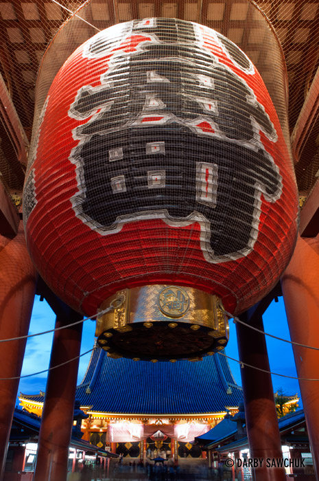 The giant lantern hanging in the Hozomon gate at Sensoji temple at night in Asakusa, Tokyo, Japan.