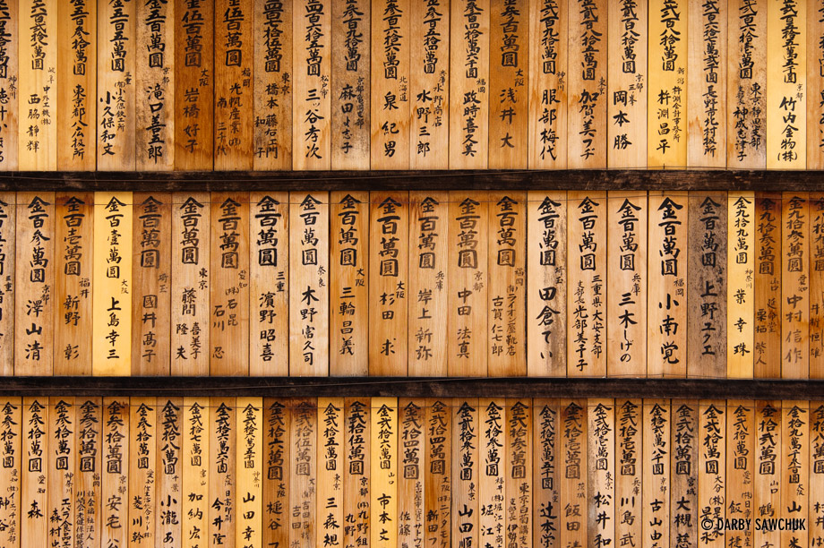 Prayer boards displayed at Fushimi Inari Shrine in Kyoto, Japan.