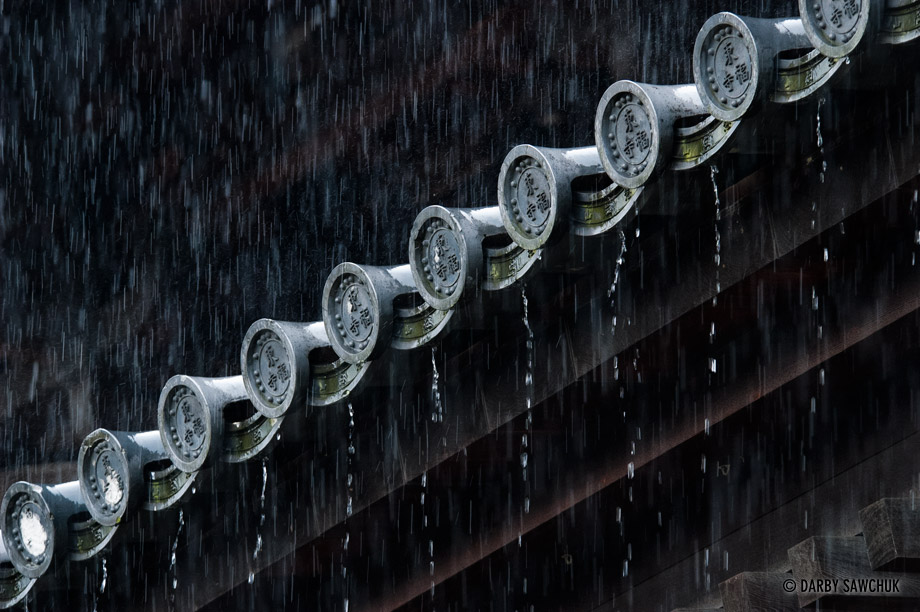 Rain drips from the roof of the Tofukoji Temple in Kyoto, Japan.