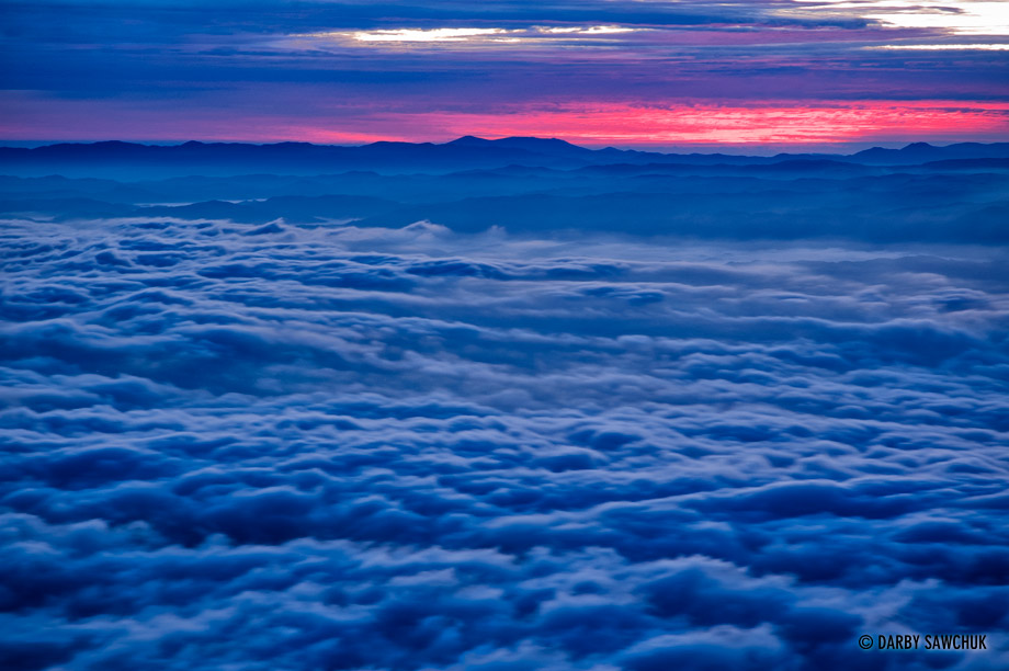 A view from above the clouds on top of Mount Iwate at dawn.