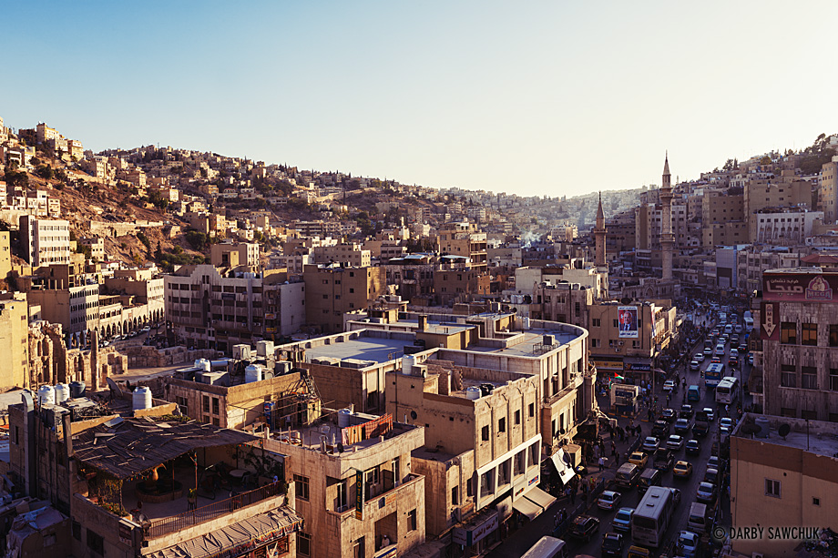 The crowded hills of Amman, Jordan's capital, overlook busy roads beneath.