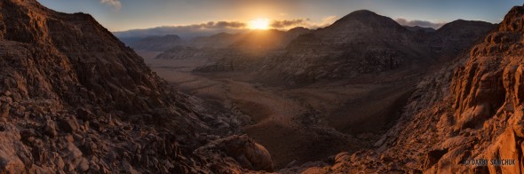 A panoramic view of the sunrise from a ridge on Jabal Umm ad Dami, Jordan's highest mountain.