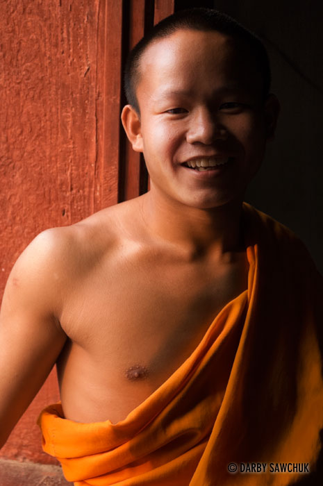 A novice Buddhist monk in Luang Prabang.