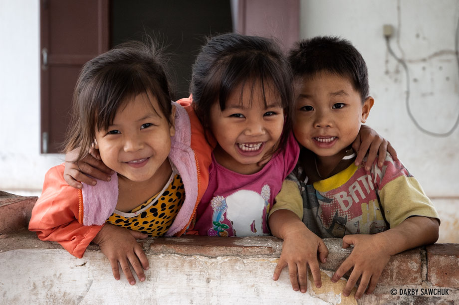 Children smile for the camera at an elementary school in Luang Prabang, Laos.