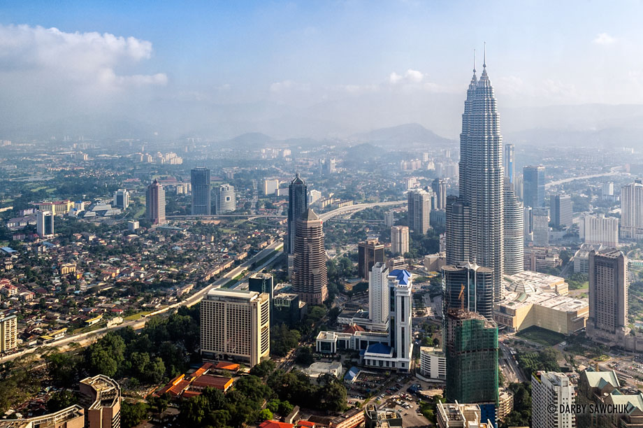 The Petronas Towers rising over the Kuala Lumpur skyline.
