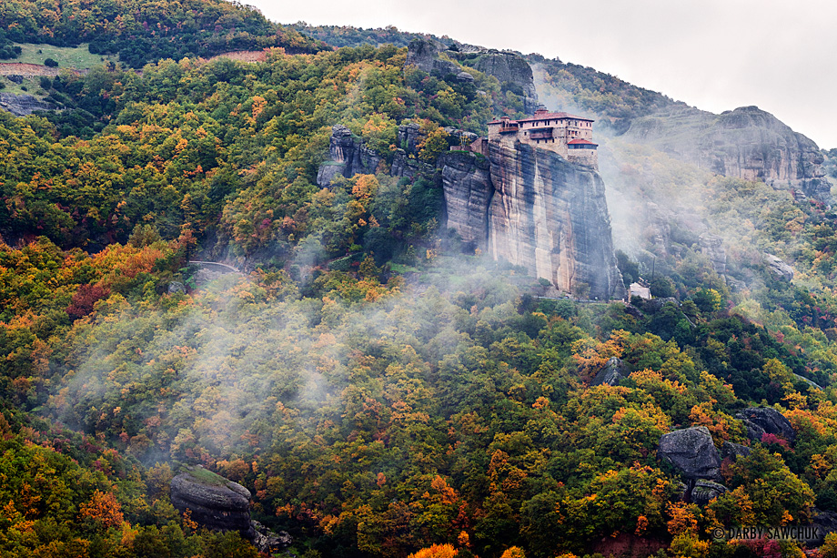 The  Monastery of Rousanou in the clouds in Meteora, Greece.