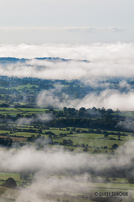 Morning mists recede from the Churnet Velley at the edge of the Peak District in Staffordshire.