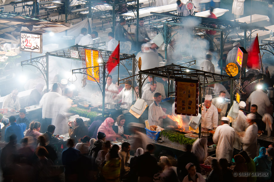 Steam and smoke rise from the food stalls in the Djemaa El-Fna market in Marrakech.