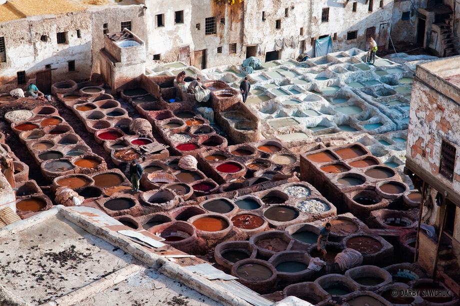 Natural chemicals like urine and feces are used to prepare the skins before they are dyed and turned into leather at the leather tanneries in the dyer's souk in Fez, Morocco.