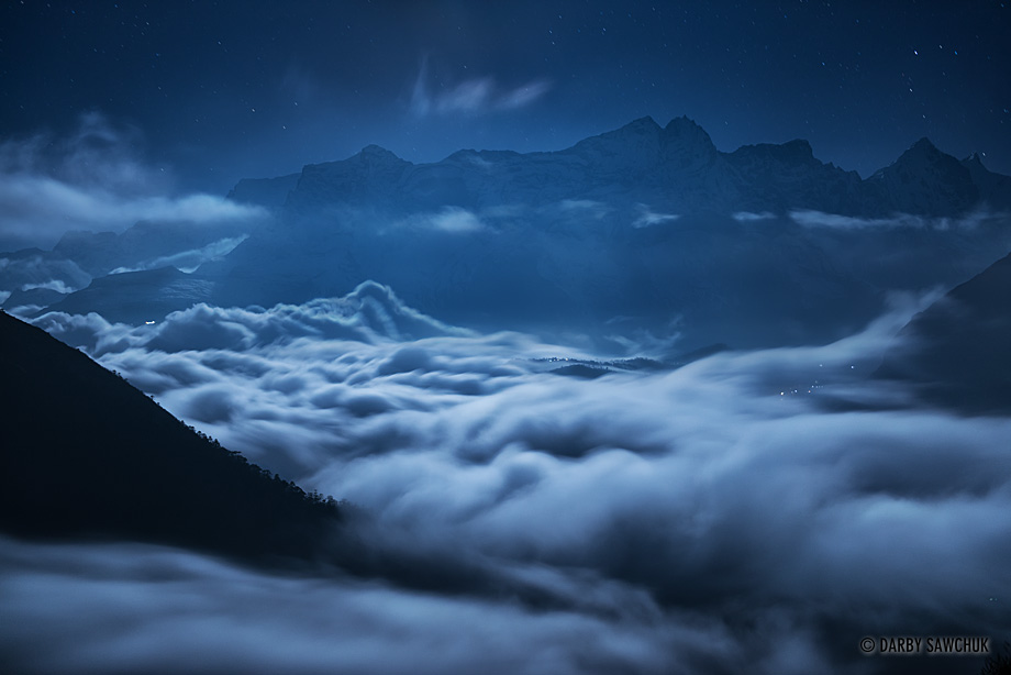 Clouds rolls through Nepal's Khumbu Valley at nighttime.