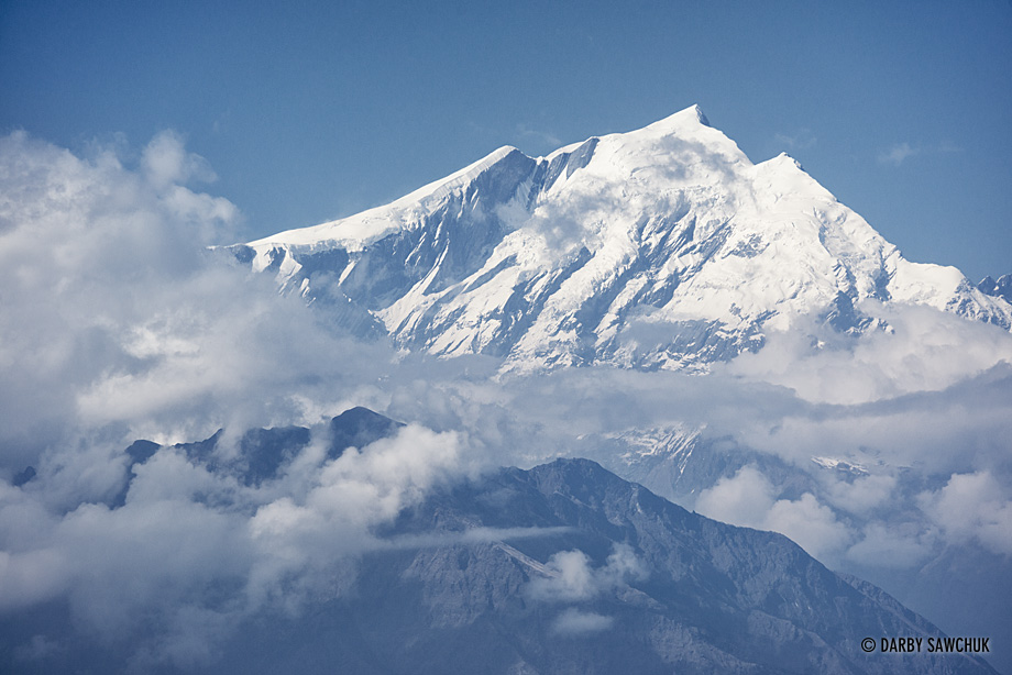 Tukuche Peak rises above the clouds in the Dhaulagiri range in Nepal.