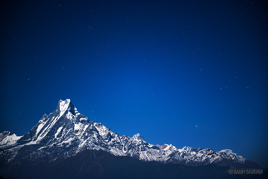 Stars shine above Mount Machhapuchchhre also known as Mount Fishtail. 
