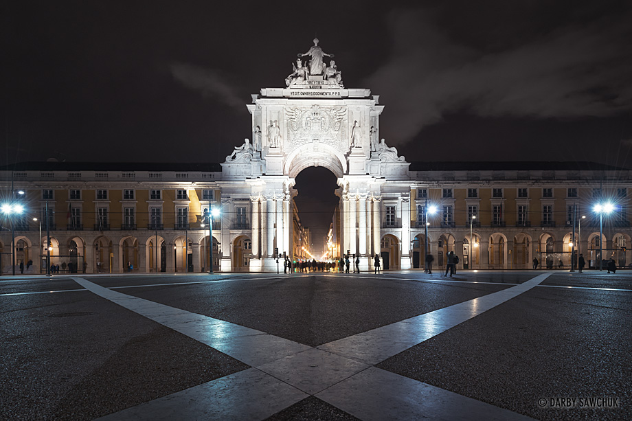 The Rua Augusta Arch viewed from Commerce Square at night in Lisbon.