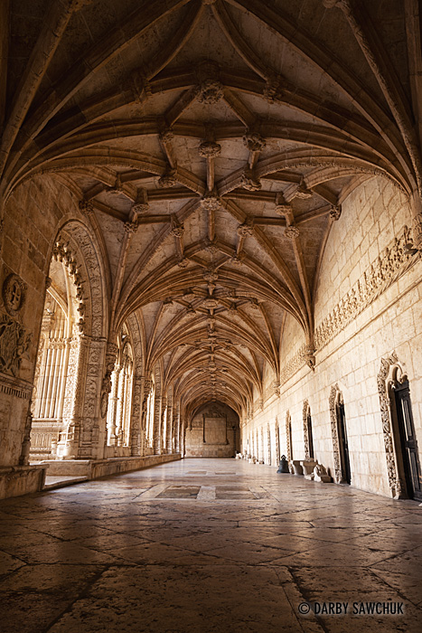 The arched cloisters of the Jerónimos Monastery, in Lisbon, Portugal.