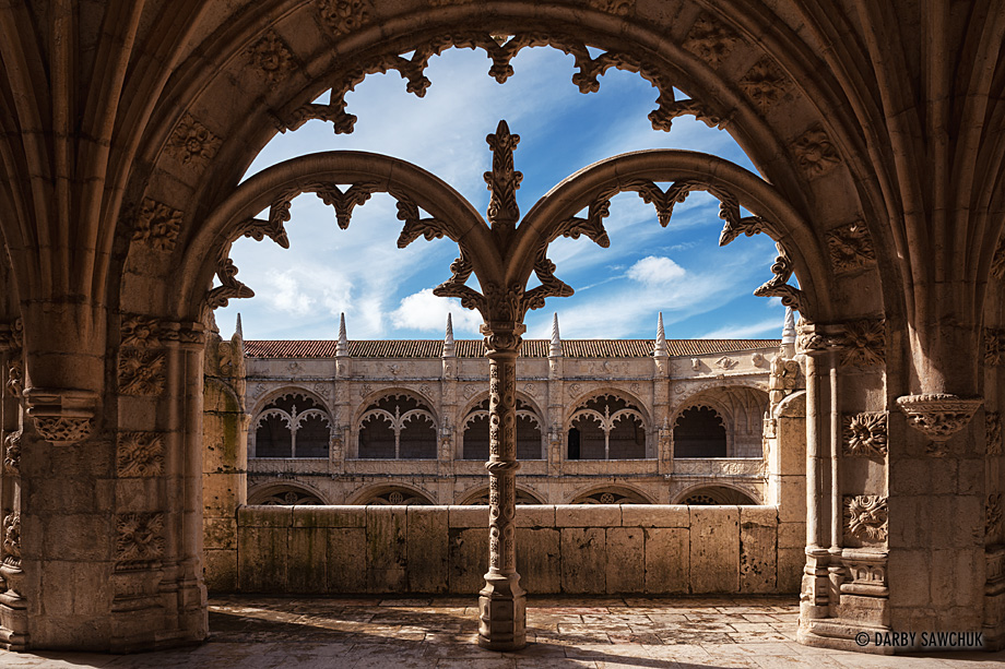 The delicate arches decorating the cloisters inside the Jerónimos Monastery.