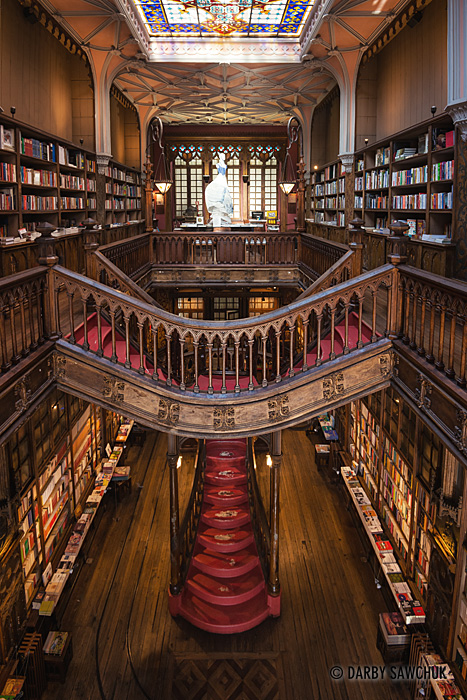 The famous wooden staircase of Livraria Lello, a bookshop in Porto.