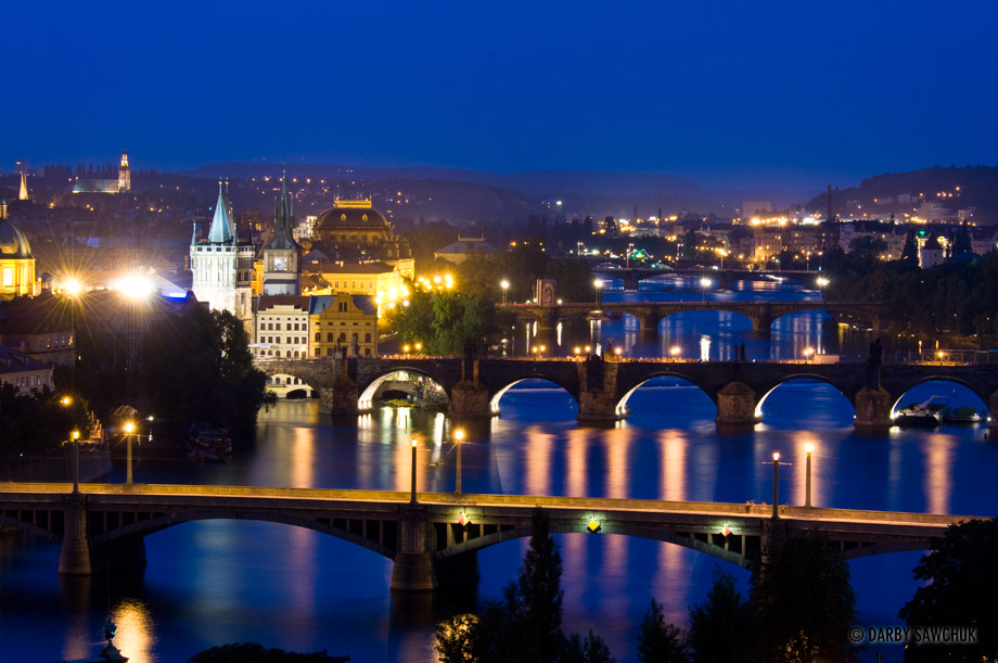 Numerous bridges including the Charles Bridge span the river Vltava in Prague, Czech Republic.