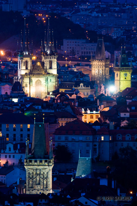 The many towers and spires of Prague at night.