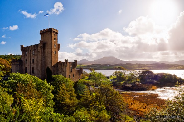 Dunvegan Castle, looking across to Macleod's Tables on the Isle of Skye, Scotland.