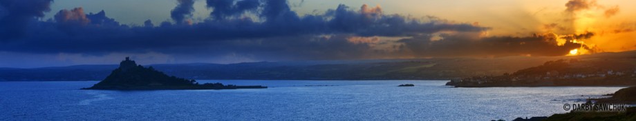 An even more panoramic view of St. Michael's Mount at sunset in Cornwall, UK.