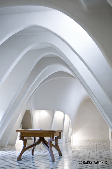 A white, arched room inside Gaudi's Casa Batllo.