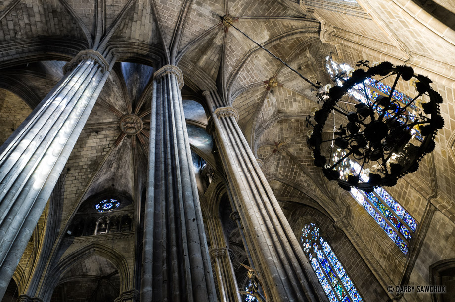 Columns rise to the gothic arches of Barcelona Cathedral.