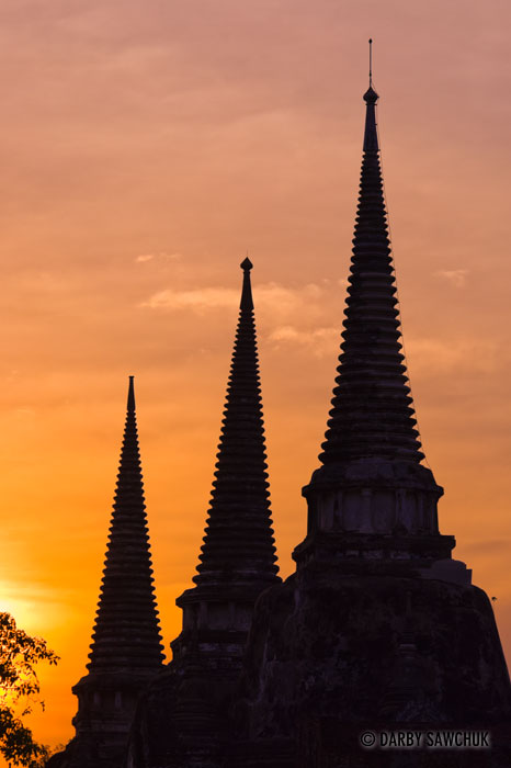The ruins of Wat Phra Si Sanphet in Ayutthaya, Thailand at sunset.