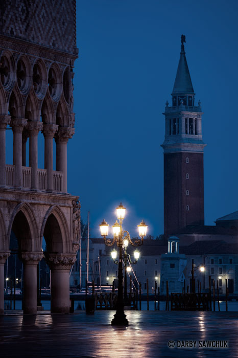 Piazza San Marco in Venice at dawn with the Doge's Palace on the left and Isola San Giorgio Maggiore in the distance on the right.
