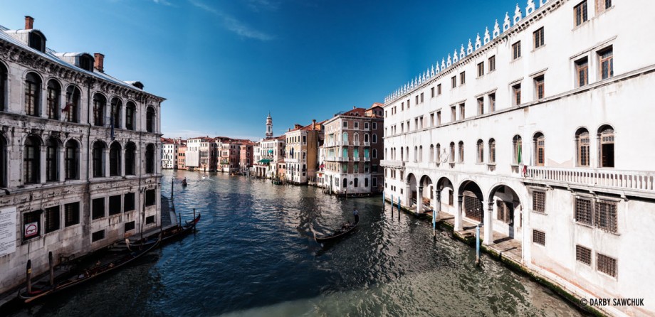 A panoramic view of the Grand Canal from the Rialto Bridge in Venice, Italy.