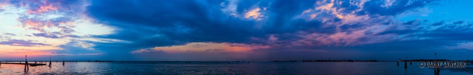 A panoramic of the lagoon north of Venice at dusk.