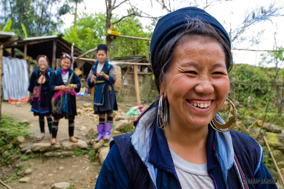Black Hmong women laugh in Sa Pa Vietnam.