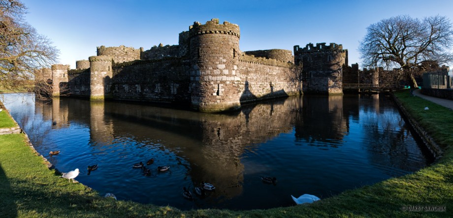 A panoramic view of the moat surrounding Beaumaris Castle on the isle of Anglesey in North Wales.